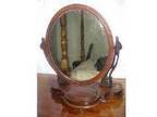 Antique dressing table mirror. Dark wood frame and stand....